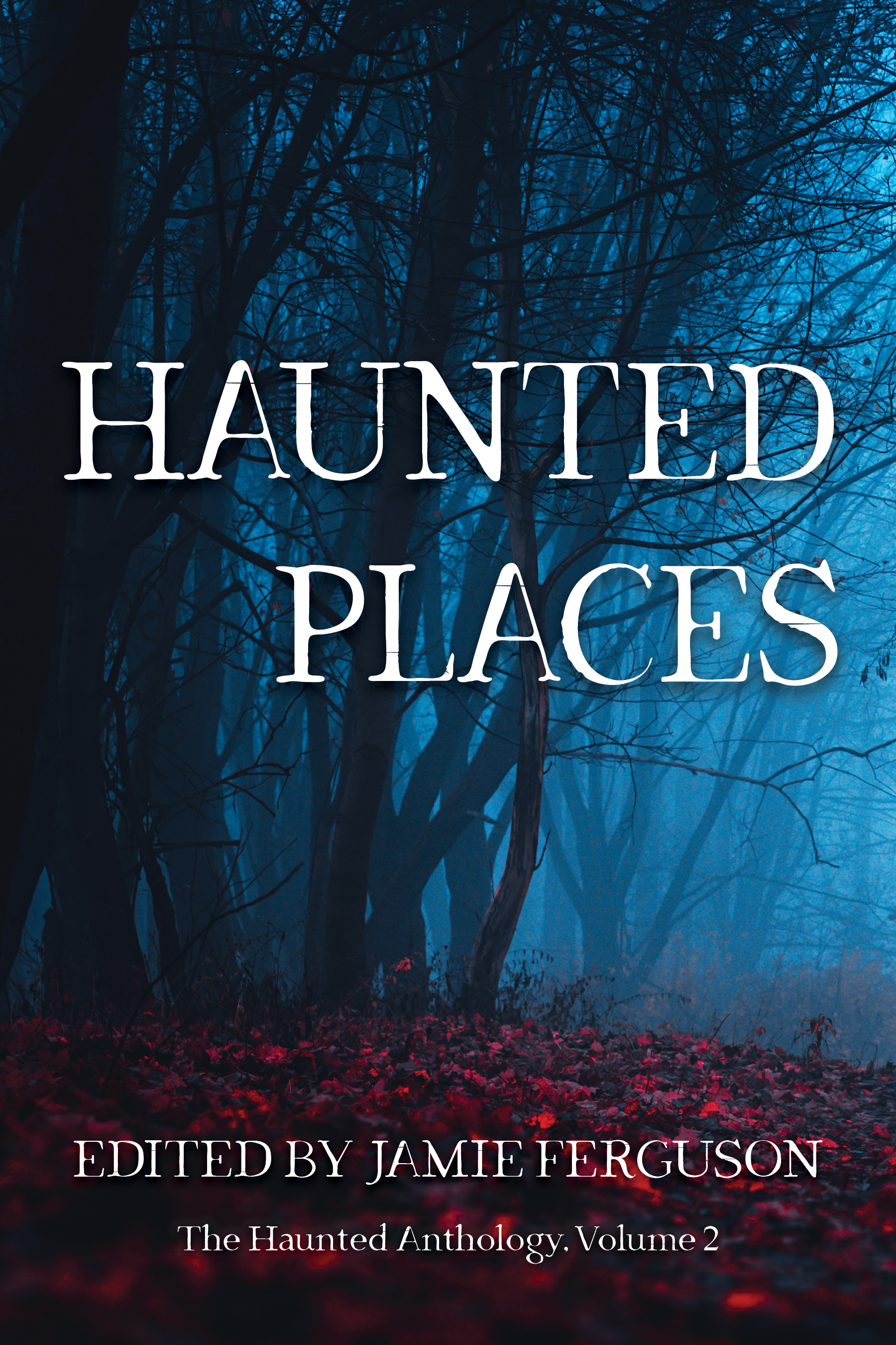 The cover of Haunted Places, edited by Jamie Ferguson. A mist-filled, shadowy forest with black, leafless trees stretches across the background. The ground is carpeted in vivid crimson leaves. The title floats in large white letters at the center of the mist. The back cover features a lyrical description of ghostly tales of memory, love, and haunting, framed by the dark, atmospheric landscape.